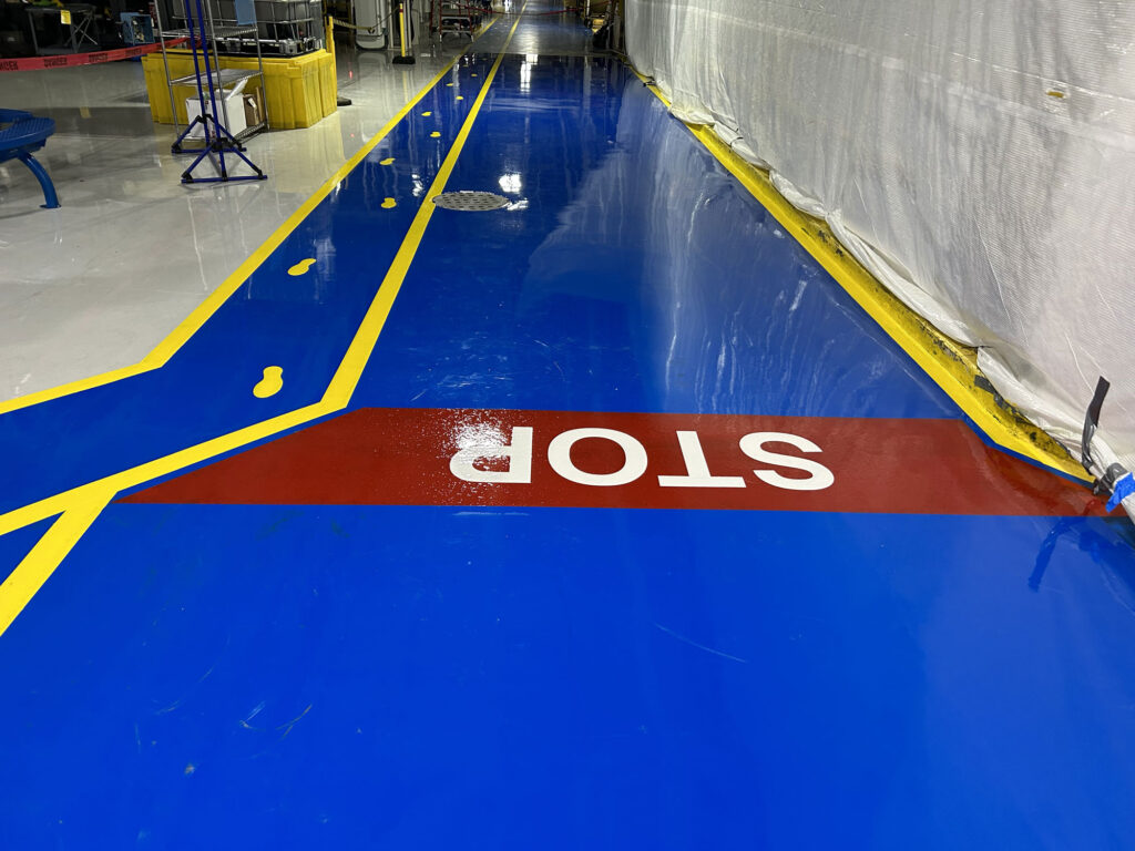 Epoxy Flooring with Safety Signaling and Pedestrian Walkway